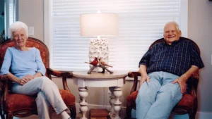 elderly couple smiling for a picture