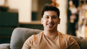 A man smiling for a picture